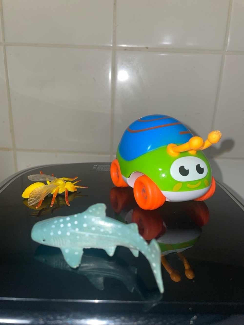 Colorful Wind-Up Bug Toy - Bright Green & Blue with Orange Wheels